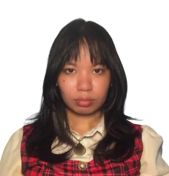 A professional headshot of a person against a neutral background.